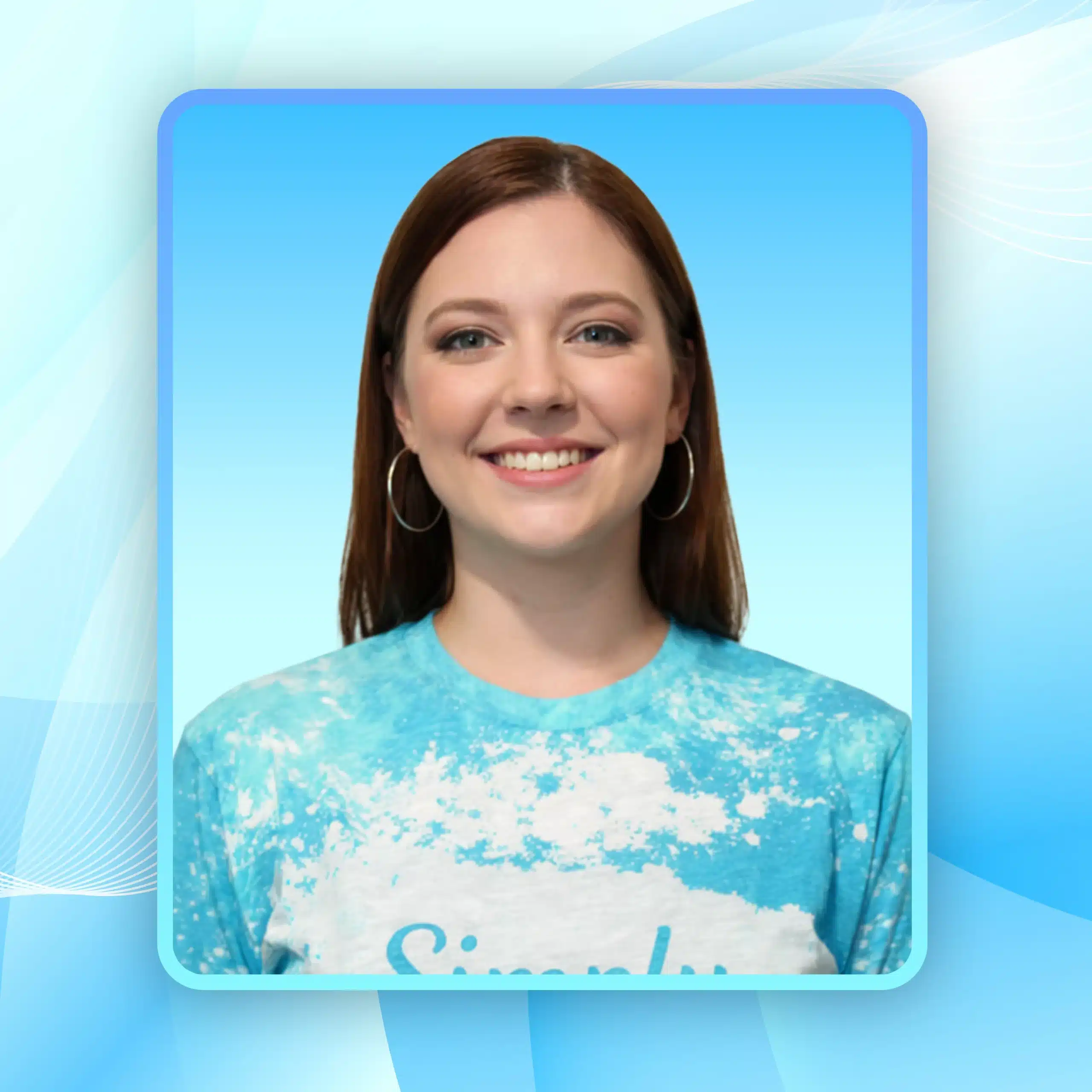 Smiling maid wearing a blue tie-dye Simply Maid shirt, representing the dedicated cleaning team at Simply Maid.