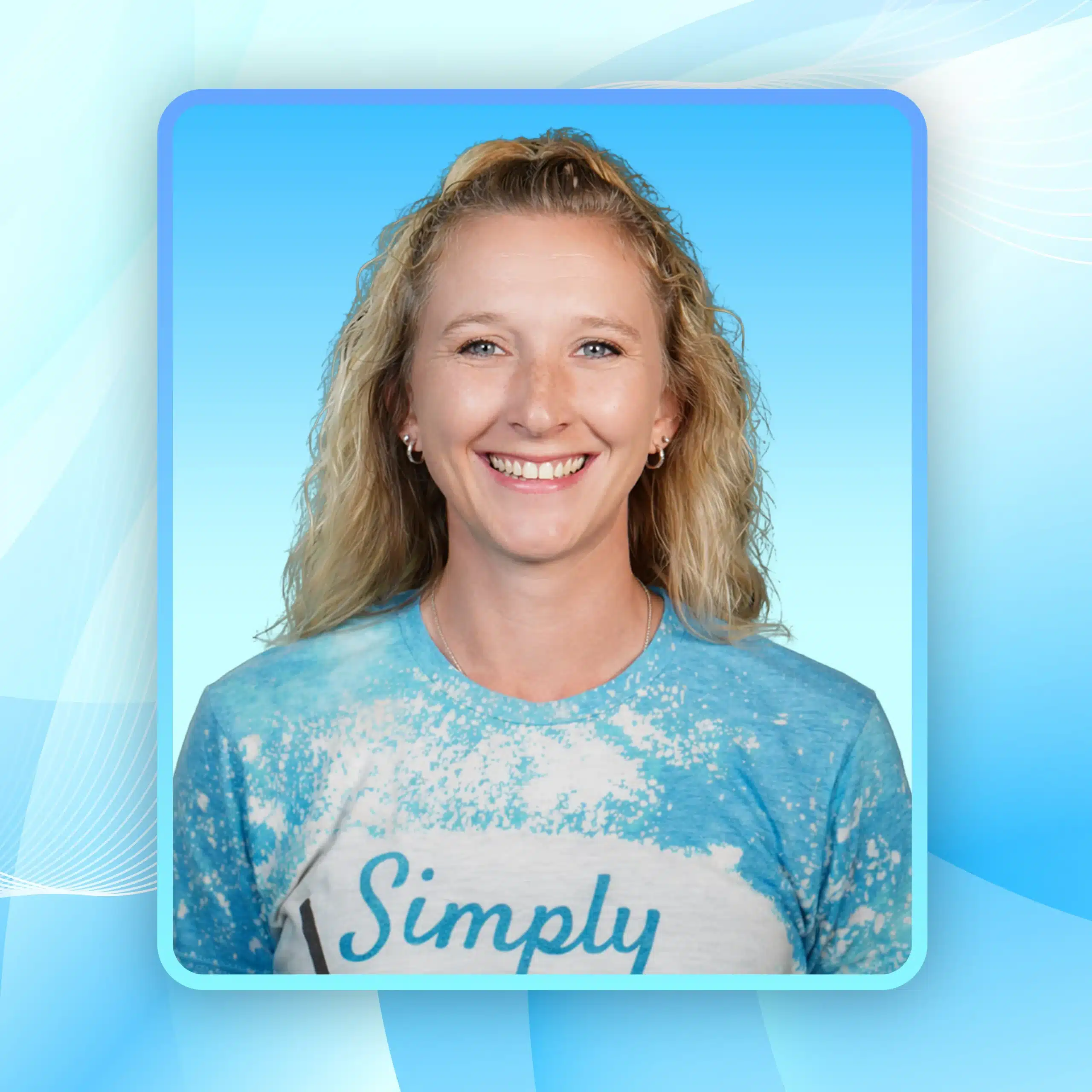 Anita, maid at Simply Maid, smiling in a blue and white shirt with the company logo, set against a bright blue background.